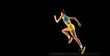 © Lustre Art Group  - Female athlete in action. Young fitness sportive girl in sports uniform running, training isolated over dark background. Dynamic movements, running technique.