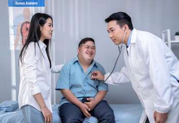 Asian mother and son coming for check-ups and consulting health problems with doctors.