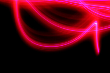 Wall Mural - abstract red lines on black background with light painting technique