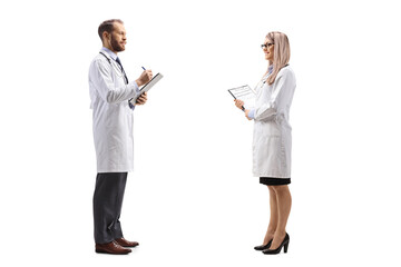 Poster - Doctor talking to a female colleague and writing a document