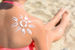 © New Africa - Little girl with sun protection cream on back outdoors, closeup. Space for text