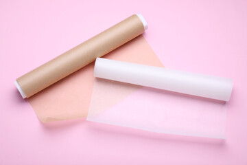 Wall Mural - Rolls of baking paper on pink background, top view