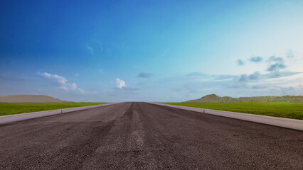 Poster - Asphalt road with green grass