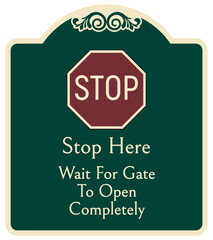 Wall Mural - Decorative automatic gate warning sign and labels stop here wait for gate to open completely