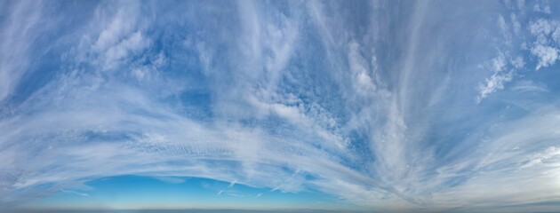 Wall Mural - fantastic clouds against blue sky, panorama