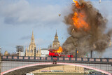 Fototapeta Przestrzenne - Bus explodes on Lambeth bridge during filming for a movie in London