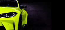 Yellow Sport Car Headlights On Black Background	