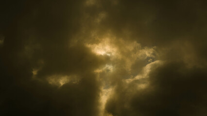 Wall Mural - Time lapse of golden clouds moving through the sky at sunset. golden sunset sky nature background.