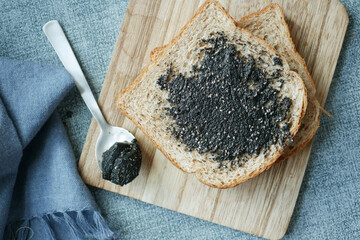 Wall Mural - Black sesame spread on a bread 