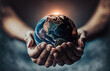© IBEX.Media - Earth at night in human hands