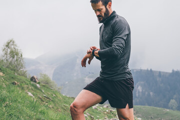 Wall Mural - man running in the mountains