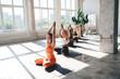 © BullRun - Group of diverse women in yoga class
