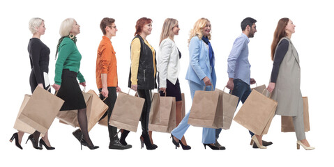 Wall Mural - a group of people are running paper shopping bags