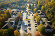© bilanol - View from above of apartment residential condos between yellow fall trees in suburban area in South Carolina. American homes as example of real estate development in US suburbs