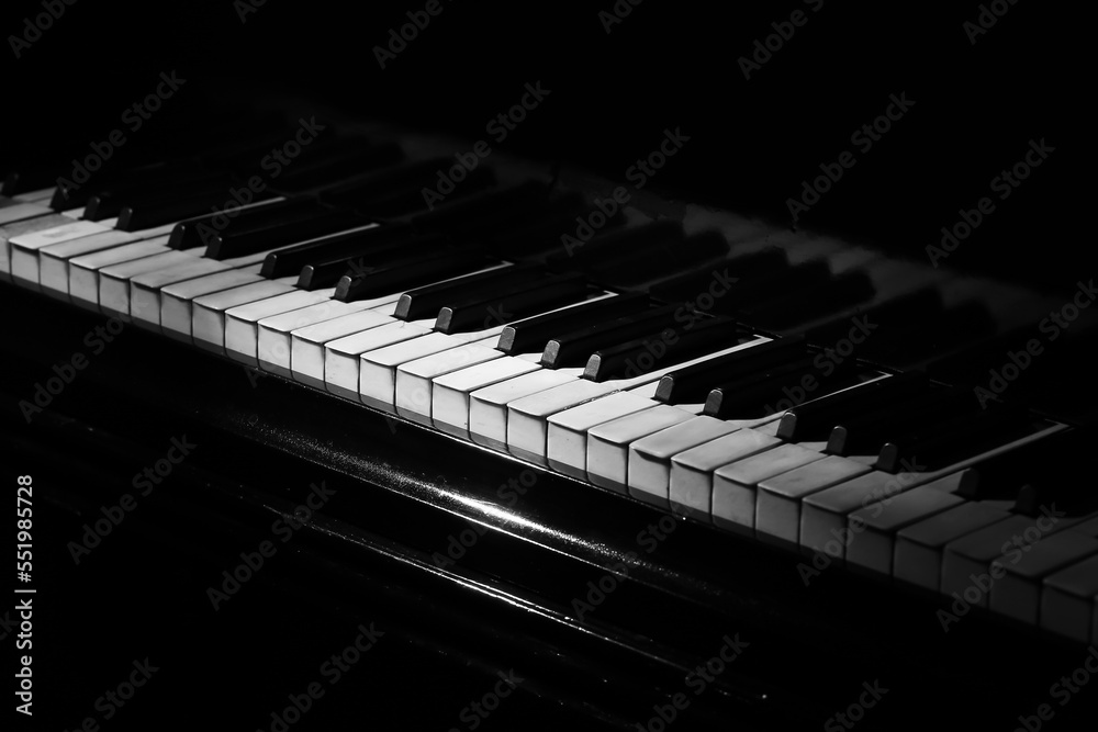 Keys of classic grand piano, closeup