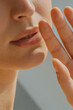 Sensual beautiful woman, lips and fingers close up