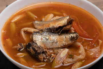 Poster - Tom Yum canned fish in a cup. Spicy soup.