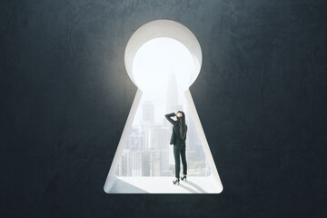 Poster - Abstract image of thinking businesswoman standing in keyhole opening and looking into the distance on blurry city background. Vision, future and think concept.