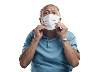 Wall Mural - PNG Shot of an older man wearing a protective face mask in a studio.