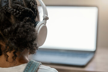 Poster - Girl, headphones and laptop screen in elearning education, homeschool class or study support in house lockdown or quarantine. Zoom, headset and child on student technology software with mock up space