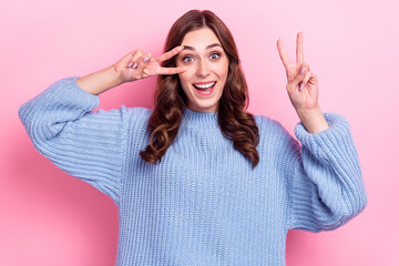 Canvas Print - Portrait of overjoyed cheerful lady toothy smile hands fingers show v-sign near eye isolated on pink color background