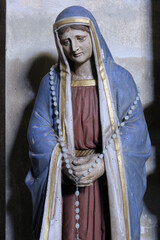 Virgin Mary under the cross, statue in the parish church of St. Catherine of Alexandria in Ribnicki Kunic, Croatia