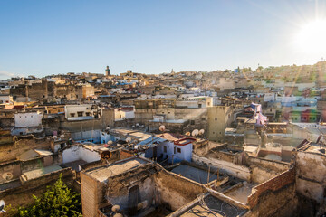 Wall Mural - Aerial panoramic view of historic downtown called medina at sunset, Fez, Morocco.