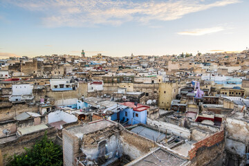 Wall Mural - Aerial panoramic view of historic downtown called medina at sunset, Fez, Morocco.