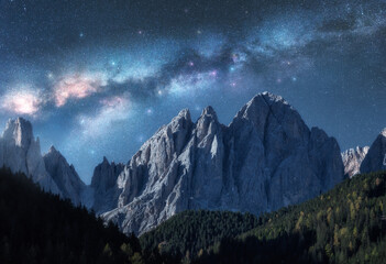 Wall Mural - milky way over beautifull rocks at starry night in summer in dolomites, italy. landscape with blue s