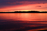 Fototapeta Paryż - Dusk on a lake with evening clouds 3