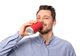 Wall Mural - Happy man drinking from tin can on white background