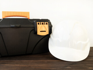 Tool box and construction safety helmet.