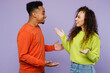 © ViDi Studio - Side view smiling happy young couple two friends family man woman of African American ethnicity in casual clothes together talk speak meet each other isolated on pastel plain light purple background