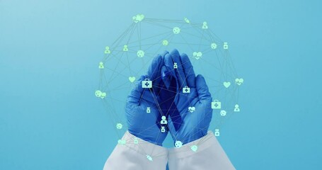 Aufkleber - Animation of network of connections with icons over hands holding blue ribbon on blue background