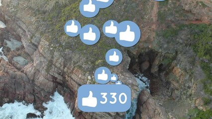 Poster - Animation of social media icons over rocky shore and sea landscape