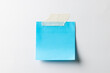 Blue sticky memo note with copy space on white background