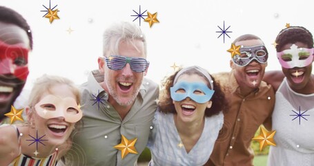 Canvas Print - Animation of christmas star over diverse friends wearing masks at party