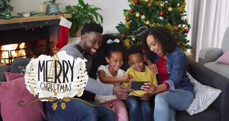 Poster - Animation of christmas greetings text over african american family at christmas