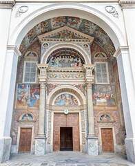 Wall Mural - AOSTA, ITALY - JULY 14, 2018: The facade of Cathedral - Cattedrale di Santa Maria Assunta with the frescoes by Ambrogio by Bellazzi da Vigevano from 16. cent.