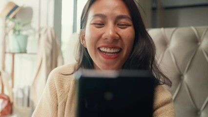 Wall Mural - Close-up Asian girl with white cream pajamas use smartphone selfie face wake up look fresh no makeup in camera on fluffy bed in bedroom holiday morning light from window. Female morning vibes concept.