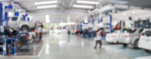 car service centre auto repair workshop blurred panoramic background