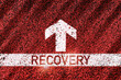 Recovery written with white arrow on road. Economic recovery  concept and business challenge idea