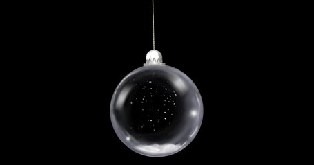 Wall Mural - animation of christmas bauble dangling over snow falling on black background