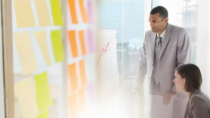 Poster - Animation of colorful sticky notes over two caucasian business people