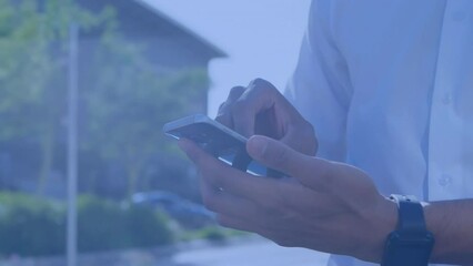 Wall Mural - Animation of abstract patterns over midsection of caucasian man using smartphone on street