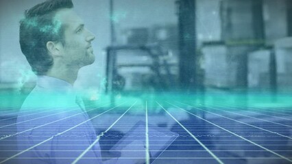 Poster - Animation of glowing blue grid over caucasian of warehouse worker