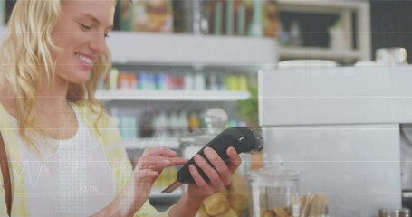 Poster - Animation of data processing over caucasian woman paying with credit card