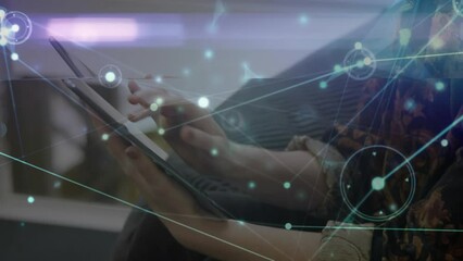 Poster - Animation of network of connections over caucasian woman using tablet