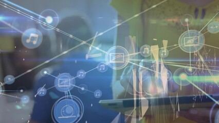 Poster - Animation of network of connections with icons over caucasian businesswoman using tablet