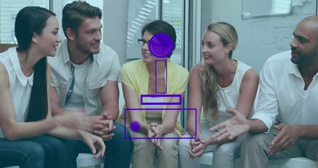 Poster - Animation of gamepad icon over diverse business people in office